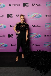 BUDAPEST, HUNGARY - NOVEMBER 14:  Rita Ora in the winners room during the MTV EMAs 2021 'Music for ALL' at the Papp Laszlo Budapest Sports Arena on November 14, 2021 in Budapest, Hungary. (Photo by John Phillips/Getty Images for MTV)